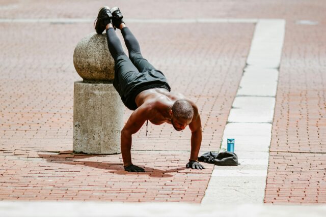 man doing inclined pushups